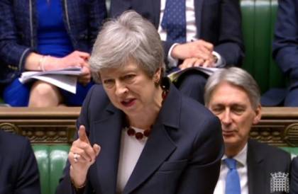 Theresa May s'engage à partir une fois son accord de Brexit adopté.jpg