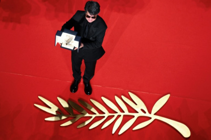 Le réalisateur et scénariste iranien Jafar Panahi, Palme d'Or du Festival de Cannes pour son film "Un simple accident", le 24 mai 2025 - Antonin THUILLIER (AFP)