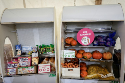 Un stand de distribution alimentaire des Restos du Coeur à Gennevilliers, au nord de Paris, le 19 novembre 2024 - Frederick FLORIN (AFP)